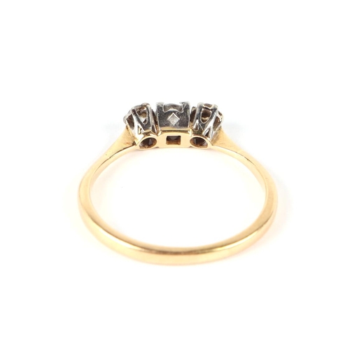 660 - An 18ct gold three-stone diamond ring, approx UK size P, 2.4g.