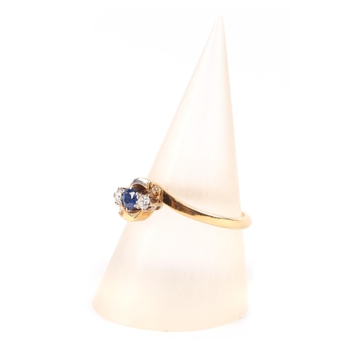 662 - An 18ct gold diamond and sapphire ring, approx UK size N, 3.1g.