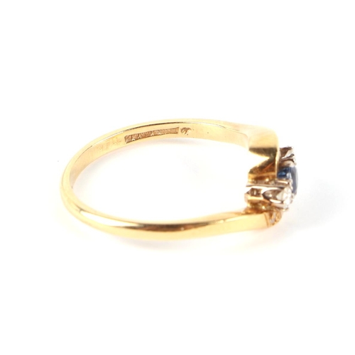 662 - An 18ct gold diamond and sapphire ring, approx UK size N, 3.1g.