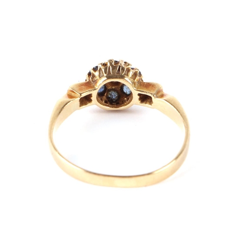 663 - An 18ct gold diamond and sapphire cluster ring, approx UK size K, 2.2g