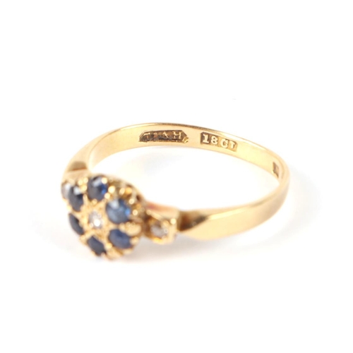 663 - An 18ct gold diamond and sapphire cluster ring, approx UK size K, 2.2g