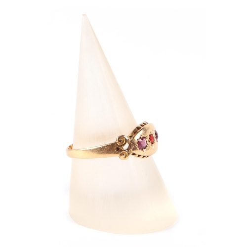 665 - An Edwardian 18ct gold three-stone ruby ring, approx UK size M, 2g.