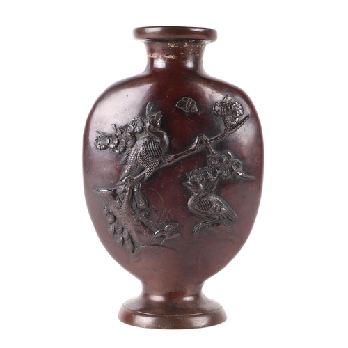 685 - A Japanese bronze vase decorated with cormorants and cranes, 25cms high.