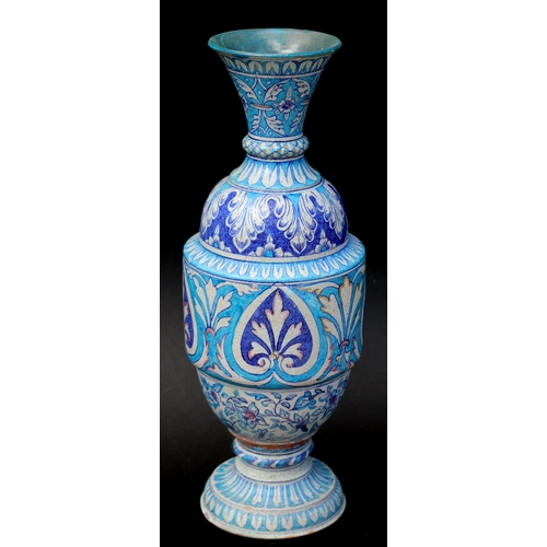 686 - A large Multan North Indian pottery vase decorated with stylised flowers, 53cms high.