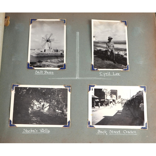 69 - A WWII military Campaign photograph album with written annotation 'Tour of Aden' (1942), containing ... 