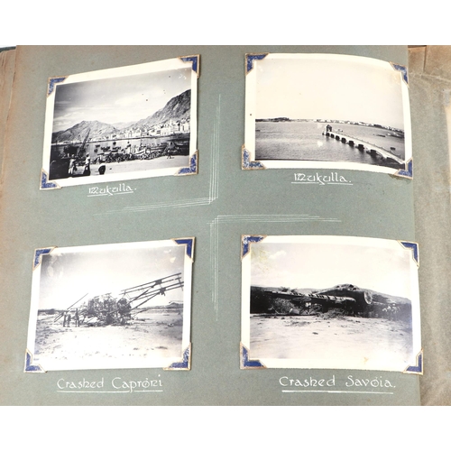 69 - A WWII military Campaign photograph album with written annotation 'Tour of Aden' (1942), containing ... 