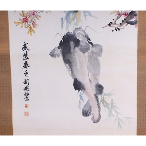 692 - A Chinese watercolour scroll painting depicting a carp, signed, 125 by 54cms.