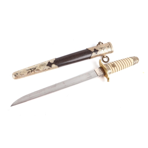 70 - A WWII Japanese Admirals short sword with gilt metal mounts, wirebound shagreen handle, steel blade ... 