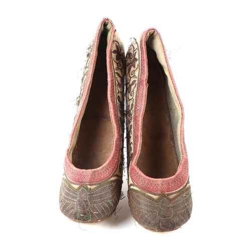 714 - A pair of Chinese silk and bullion wire shoes.