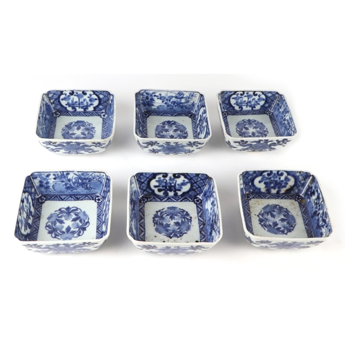 724 - A quantity of Japanese blue & white dishes of various forms decorated with landscapes, the largest 1... 