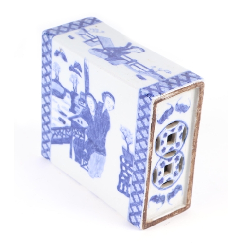 726 - A Chinese blue & white porcelain pillow decorated with ladies in pavilions, 14cms wide.