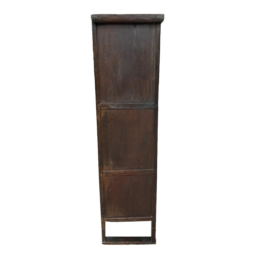 737 - A Korean floor standing cabinet with two small frieze drawers above three cupboards, 103cms wide.