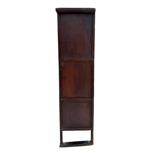 737 - A Korean floor standing cabinet with two small frieze drawers above three cupboards, 103cms wide.