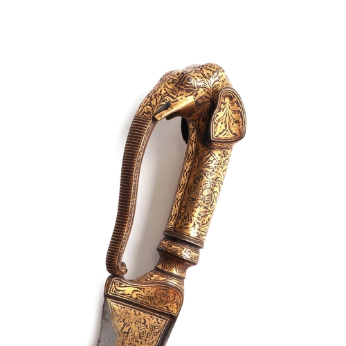 74 - An Indo-Persian Koftgari dagger in a leather scabbard with elephant head handle and watered steel bl... 