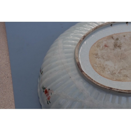 747 - A large Chinese famille vert oval bowl decorated with exotic birds and flowers, 40cm wide. Condition... 