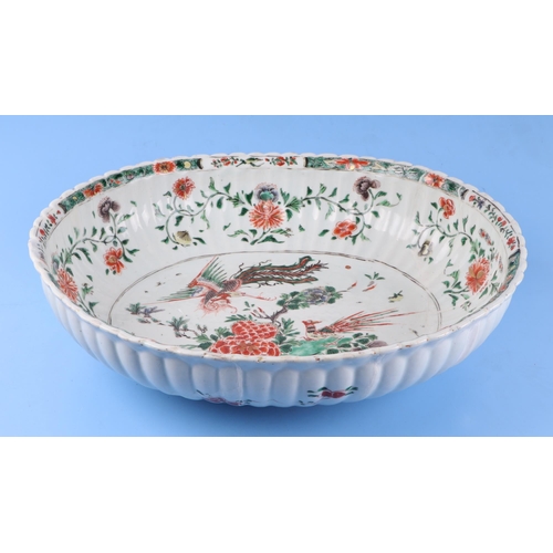 747 - A large Chinese famille vert oval bowl decorated with exotic birds and flowers, 40cm wide. Condition... 