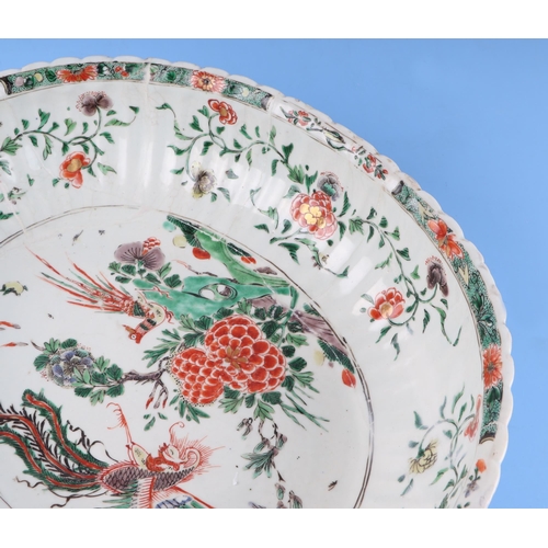 747 - A large Chinese famille vert oval bowl decorated with exotic birds and flowers, 40cm wide. Condition... 