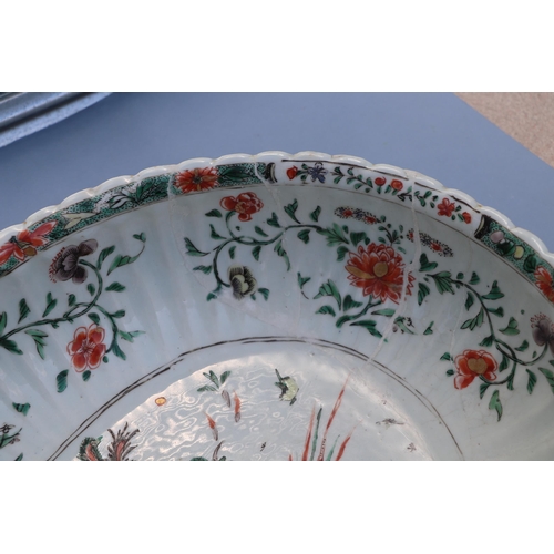 747 - A large Chinese famille vert oval bowl decorated with exotic birds and flowers, 40cm wide. Condition... 