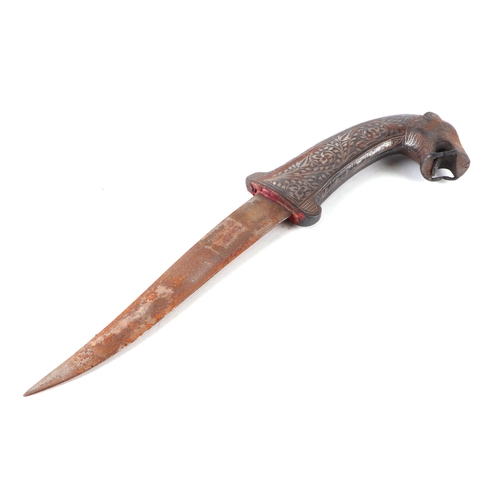 75 - An Indo-Persian dagger with white metal inlay, the handle terminal in the form of a panther's head, ... 