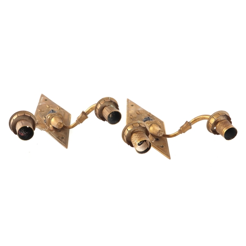 780 - A pair of gilt bronze twin-arm Blackamoor wall lights, 30cms high (2).