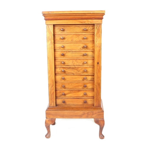 785 - A late 19th century figured walnut Wellington chest collector's cabinet of small proportions, with t... 