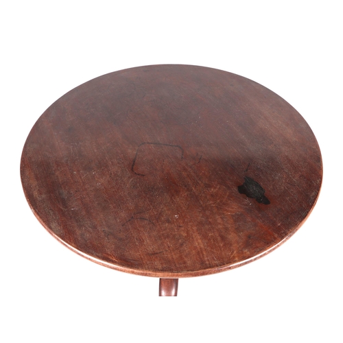 788 - A 19th century mahogany tilt-top tripod table with turned column and cabriole legs terminating in pa... 