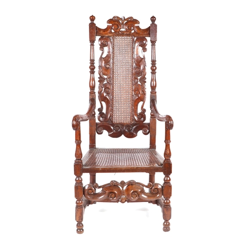 791 - A Charles I style carved beech open armchair with bergere back and seat; together with a similar sid... 