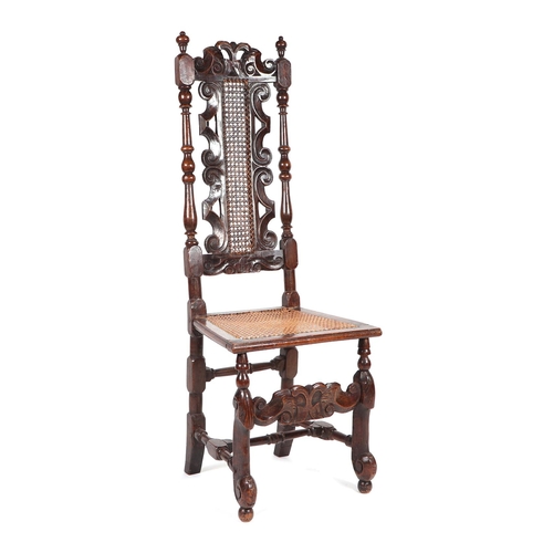 791 - A Charles I style carved beech open armchair with bergere back and seat; together with a similar sid... 