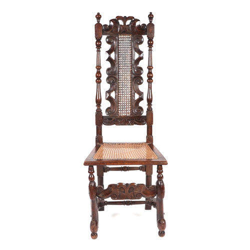 791 - A Charles I style carved beech open armchair with bergere back and seat; together with a similar sid... 