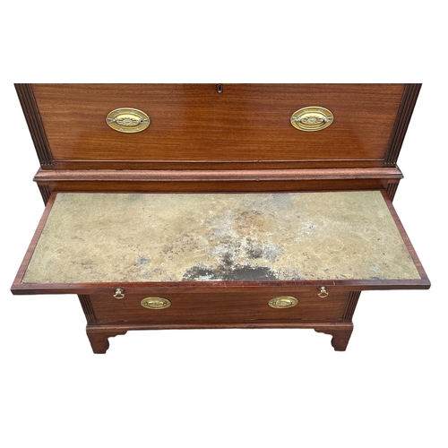 800 - A 19th century mahogany chest on chest with two short and six graduated long drawers with brushing s... 