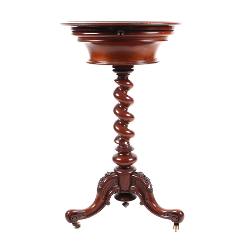 814 - A Victorian burr walnut teapoy, the circular top enclosing a fitted interior, on barleytwist column ... 