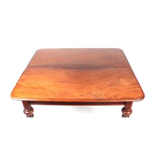 839 - A Victorian mahogany extending dining table, the rounded rectangular top inset with two extra leaves... 