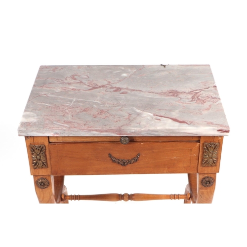 852 - A French Empire style marble topped side table with ormolu mounts and 'X' frame supports joined by a... 