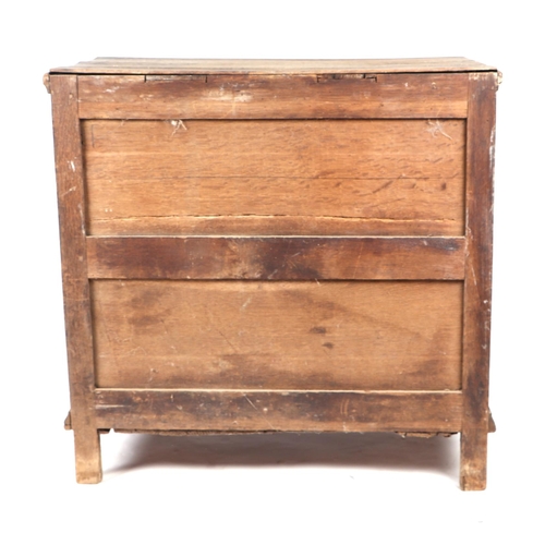 855 - A 19th century oak chest in the 17th century taste with moulded front drawers, on bracket feet, 78cm... 