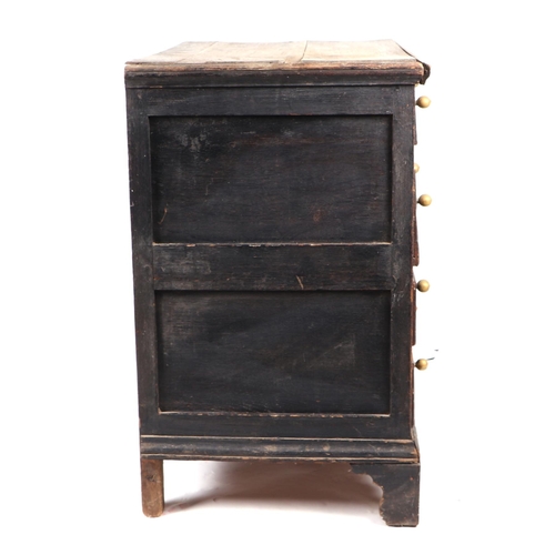 855 - A 19th century oak chest in the 17th century taste with moulded front drawers, on bracket feet, 78cm... 