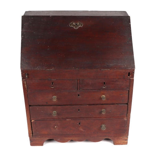 860 - A 19th century mahogany apprentice bureau, the fall front opening to reveal a fitted drawer interior... 