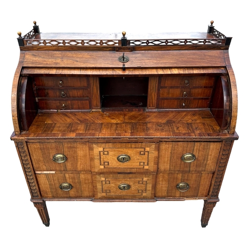 861 - A 19th century continental (possibly Dutch) walnut cylinder desk with pierced three-quarter gallery ... 