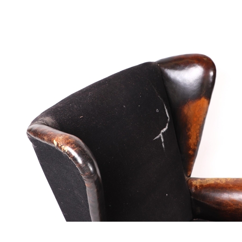 868 - Mid century modern design - a pair of Hans Wegner inspired leather and cloth lounge chairs (2).