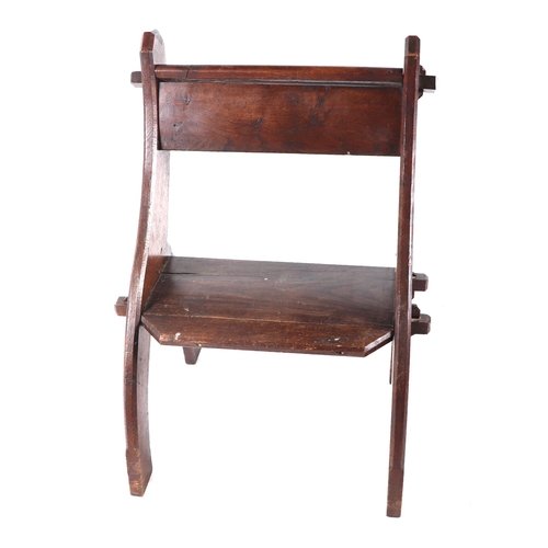 870 - A late 19th / early 20th century oak Glastonbury type chair.