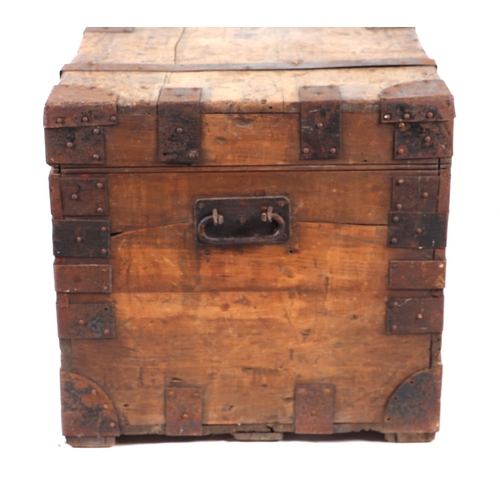 872 - A late 19th century / early 20th century zinc lined pine trunk with iron strapwork and carrying hand... 