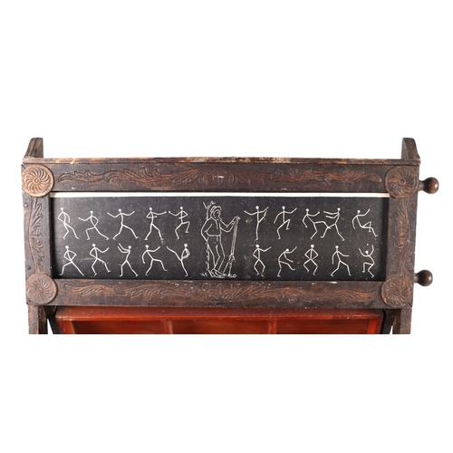 873 - A carved oak early 20th century 'A' frame educational desk with drop-down writing slope and adjustab... 