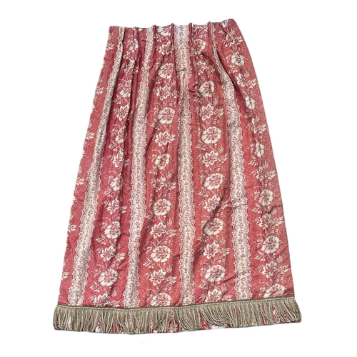 89 - Three interlined  pleated curtains decorated with flowers on a pale red ground, each curtain approx ... 