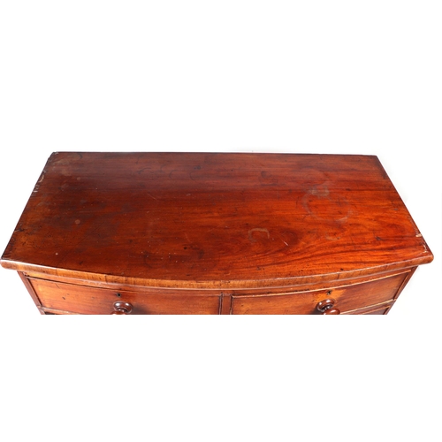 890 - A 19th century mahogany bowfronted chest of two short and three graduated long drawers, 102cms wide.