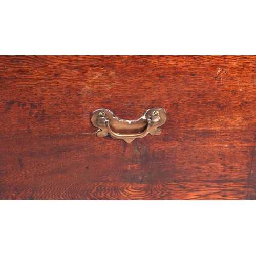 894 - A late 18th / early 19th century oak mule chest with two drawers, on bracket feet, 125cms wide.