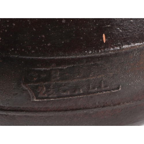 9 - A 19th century cast iron 2 1/2 gallon cauldron with tripod feet and swing handle, 28cms diameter.