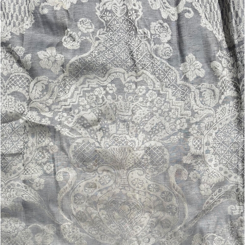 91 - Two pairs of good quality interlined curtains decorated with foliate scrolls on a grey ground, each ... 