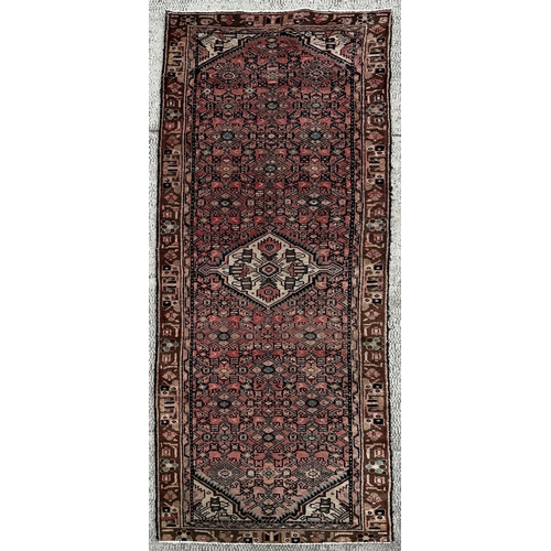 98 - A Persian hand knotted Hamadan runner with repeat floral Mina Khani design and central ivory medalli... 