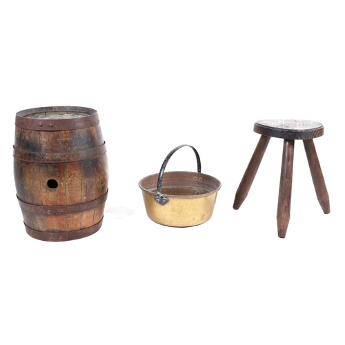 464 - An oak coopered barrel, 42cms high; together with an oak tripod dairy stool, 25cms diameter; and a b... 