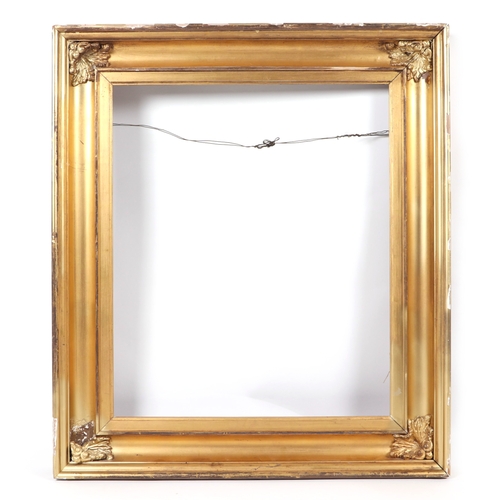 251 - A giltwood picture frame with 50 by 62cm window aperture; together with another example with 40 by 3... 