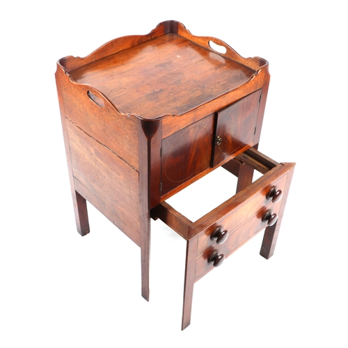 803 - A Georgian mahogany commode night stand, the twin handled galleried top above a cupboard with pull-o... 